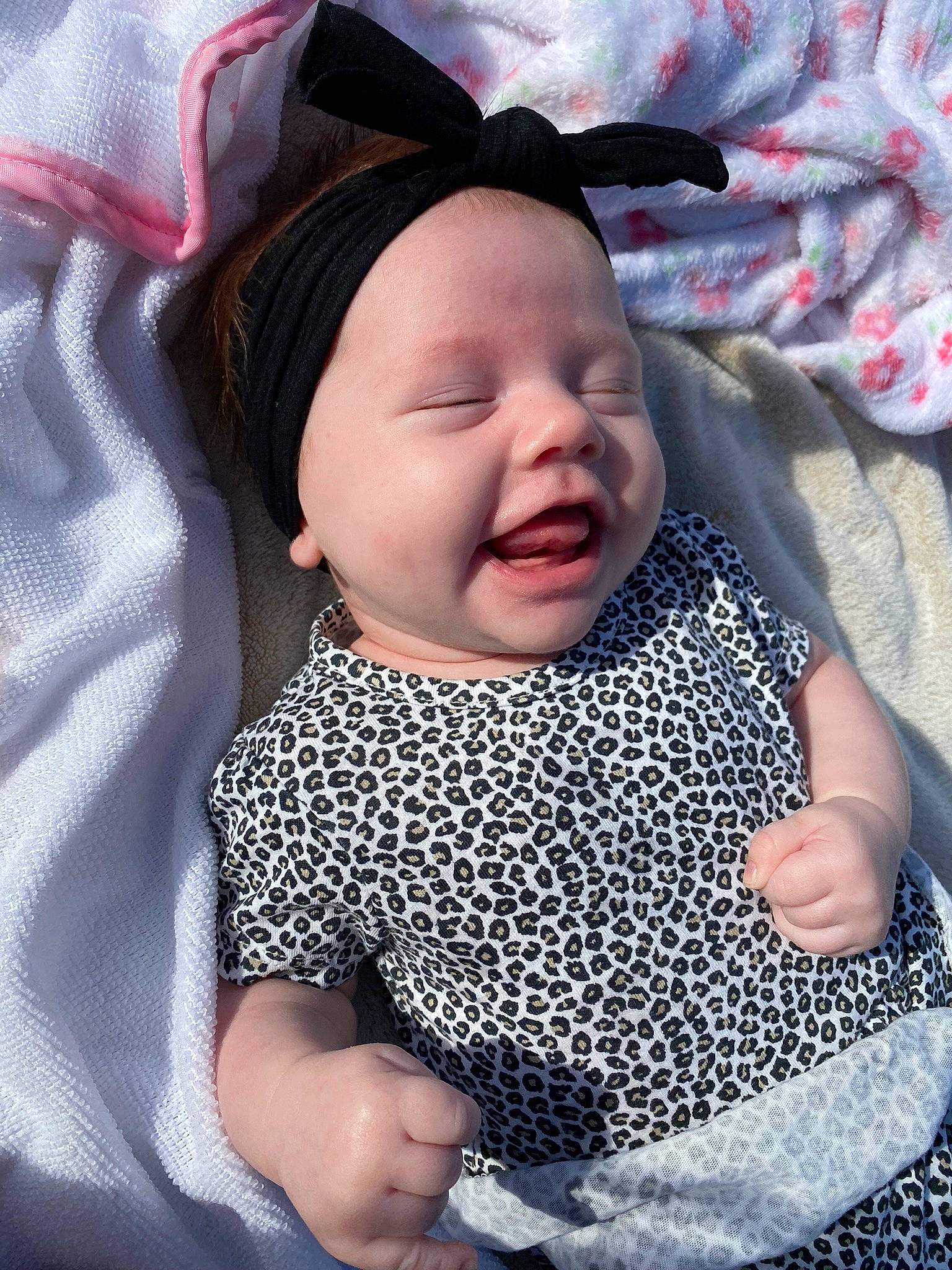 Blaire is registered to the contest to win money with this photo: baby, baby_products, baby_toddler_clothing, cheek, child, comfort, cool, eye, fashion_accessory, finger, fun, gesture, happy, headwear, lip, mouth, pattern, person, pink, skin