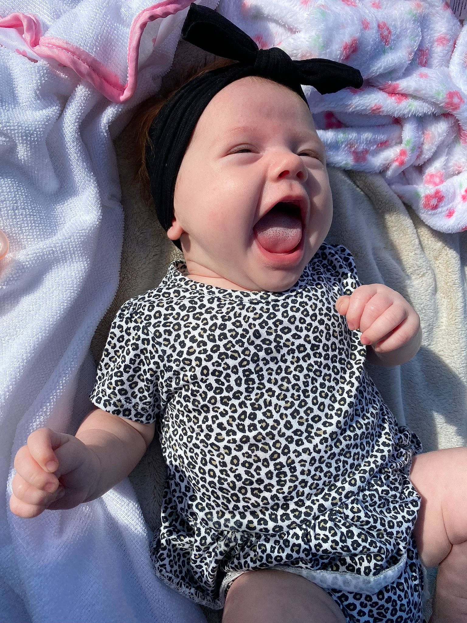 Blaire is registered to the contest to win money with this photo: baby, baby_toddler_clothing, cheek, comfort, eye, face, facial_expression, finger, gesture, hand, happy, head, headgear, headwear, lip, mouth, outerwear, person, photograph, skin