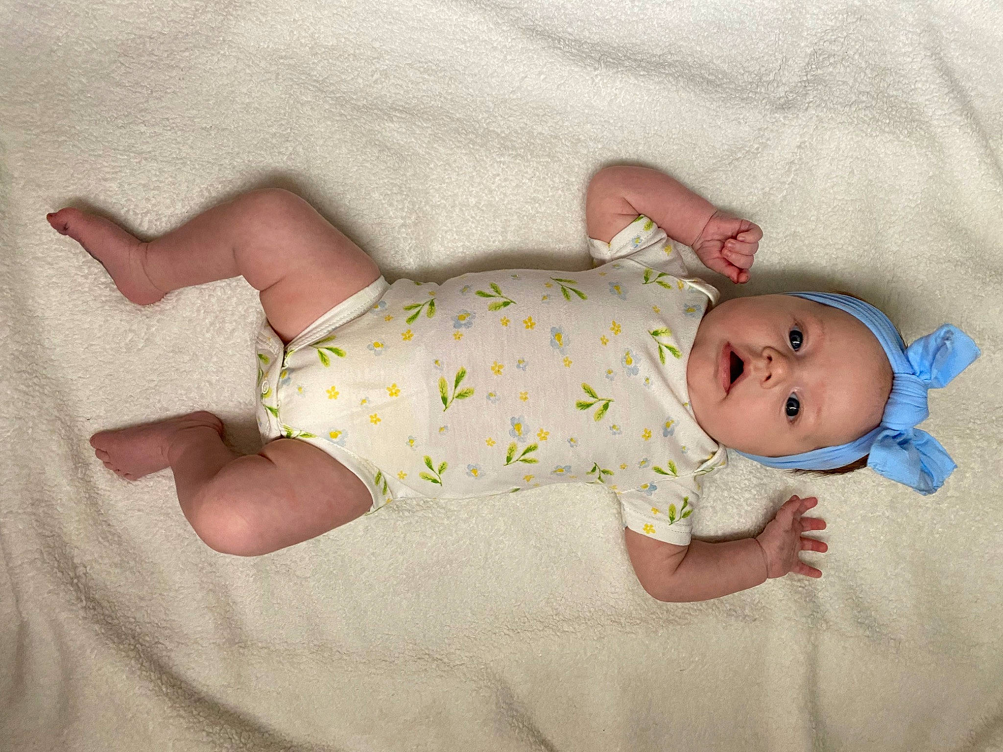 Blaire is registered to the contest to win money with this photo: arm, baby, baby_products, baby_safety, baby_sleeping, baby_toddler_clothing, child, comfort, face, finger, foot, hand, hat, linens, pattern, person, skin, sleeve, sock, textile