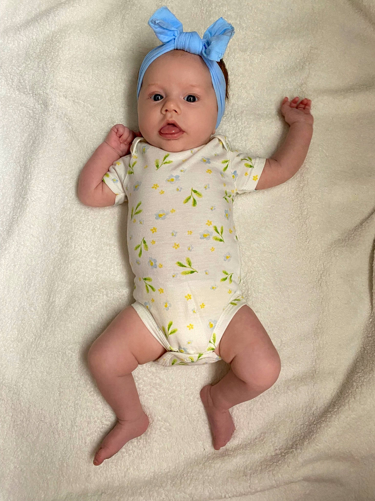 Blaire joined the competition — help win amazing prizes! arm, baby, baby_toddler_clothing, child, dress, eye, face, facial_expression, finger, hand, head, headband, headwear, iris, linens, pattern, person, pink, skin, sleeve