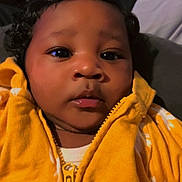 Daliah is registered to the contest to win money with this photo: baby, bodypart, clothing, coat, face, finger, fleece, hand, hat, head, hood, hoodie, jacket, knitwear, mouth, person, photography, portrait, sweater, sweatshirt
