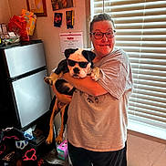 Oakley joined the competition — help win amazing prizes! bag, certificate, collar, dog, floor, glasses, holding, indoor, kitchen, light, pet, refrigerator, shadow, shorts, smiling, sunglasses, tshirt, wall_art, window_blinds, woman