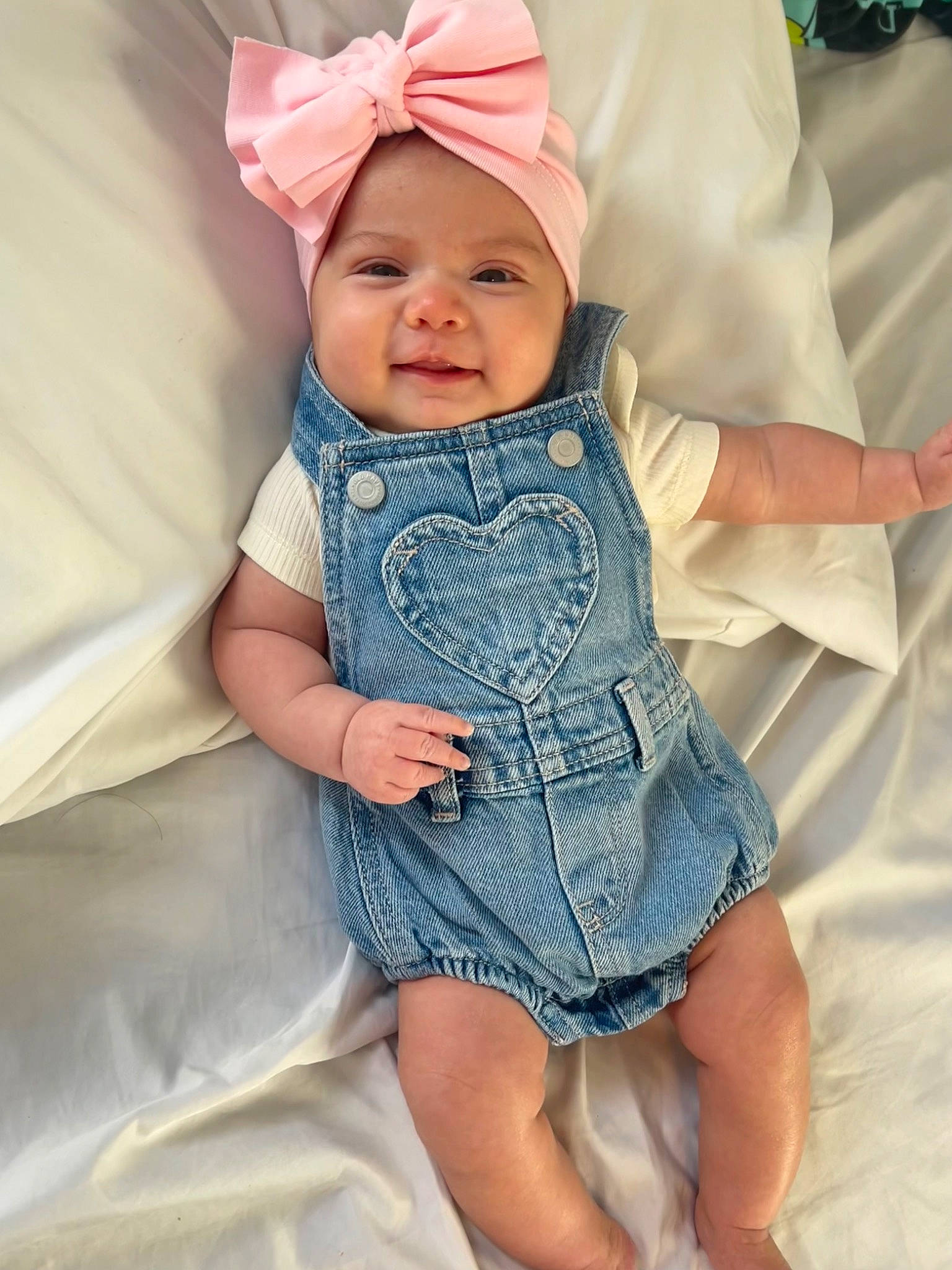 Evelyn joined the competition — help win amazing prizes! baby, baby_toddler_clothing, cap, child, collar, day_dress, dress, eye, face, happy, head, headgear, headwear, iris, pattern, person, pink, skin, sleeve, smile
