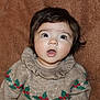 Emy participe au concours pour gagner de l'argent avec cette photo : baby, brown_background, child, cozy, cute, expression, face, hair, holiday_theme, indoors, infant, knitwear, mouth_open, person, portrait, sweater, texture, warm_clothing, wide_eyes, young_child