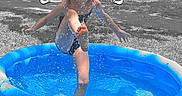 Davina joined the competition — help win amazing prizes! black_and_white_background, blue, cartoon_hands, child, fun, grass, happy, inflatable_pool, kid, outdoor, play, pool, residential_area, sidewalk, splash, splashing, summer, sunlight, text_overlay, water