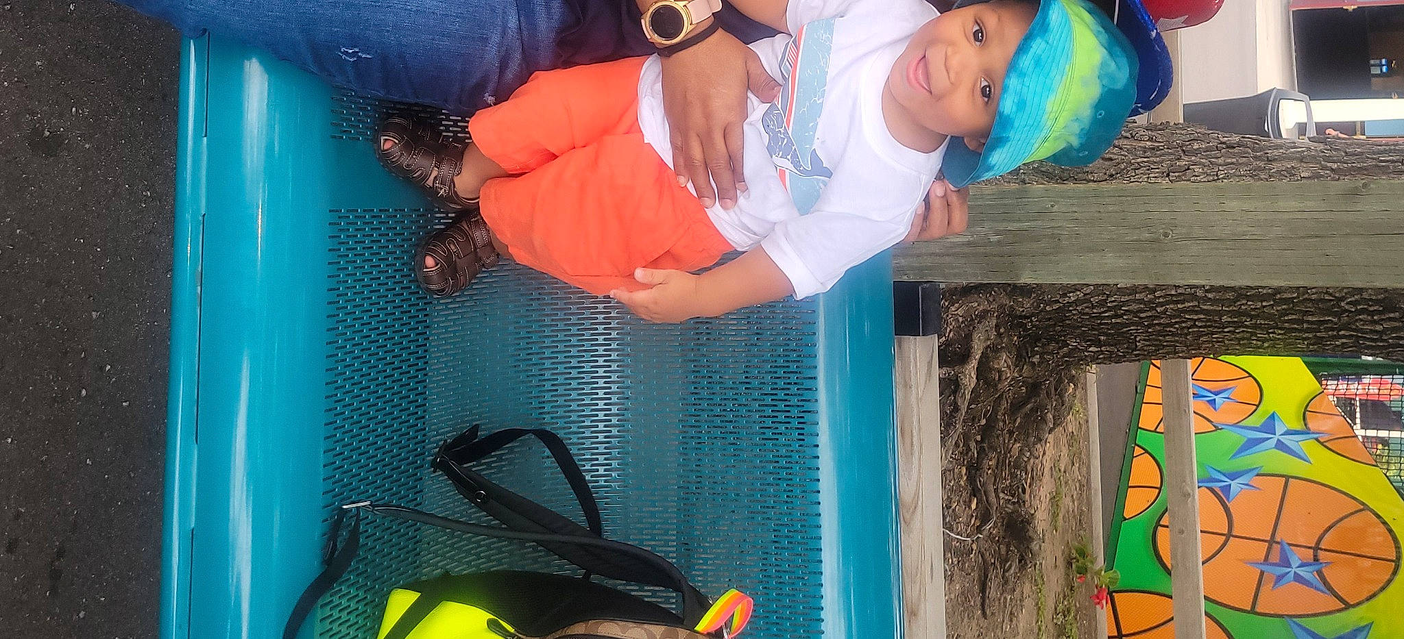 Gavin is registered to the contest to win money with this photo: aqua, azure, cap, cool, fun, green, happy, hat, headwear, leisure, light, people, person, photograph, pink, product, summer, vehicle_door, water, white