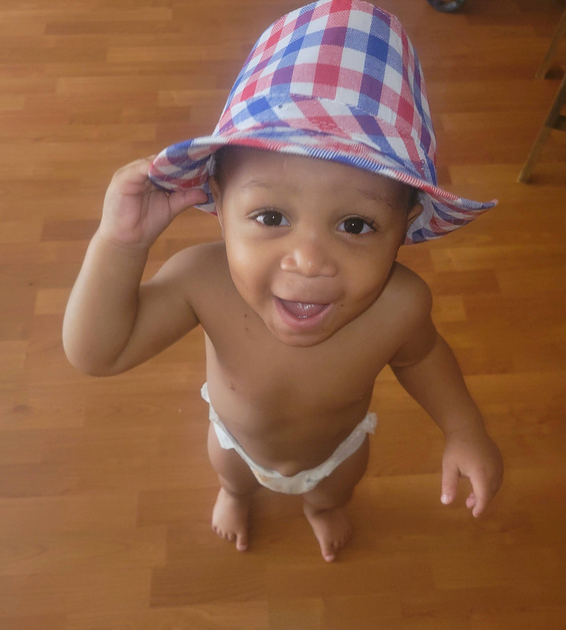 Gavin joined the competition — help win amazing prizes! arm, baby, baby_toddler_clothing, cap, chin, costume_hat, eye, eyebrow, face, flooring, hair, happy, hat, head, headwear, human_body, joy, person, sleeve, smile