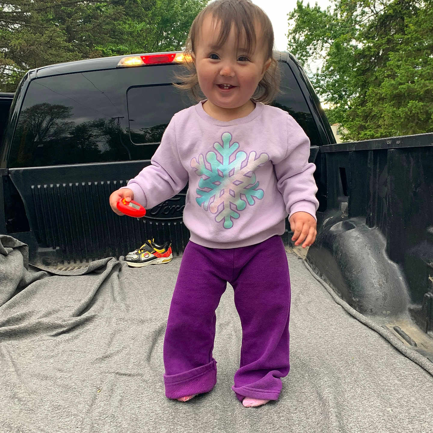 Tinka is registered to the contest to win money with this photo: child, clothing, face, female, footwear, girl, grass, head, outdoors, pants, person, photography, plant, portrait, shoe, soil, t_shirt, tree, vegetation, walking