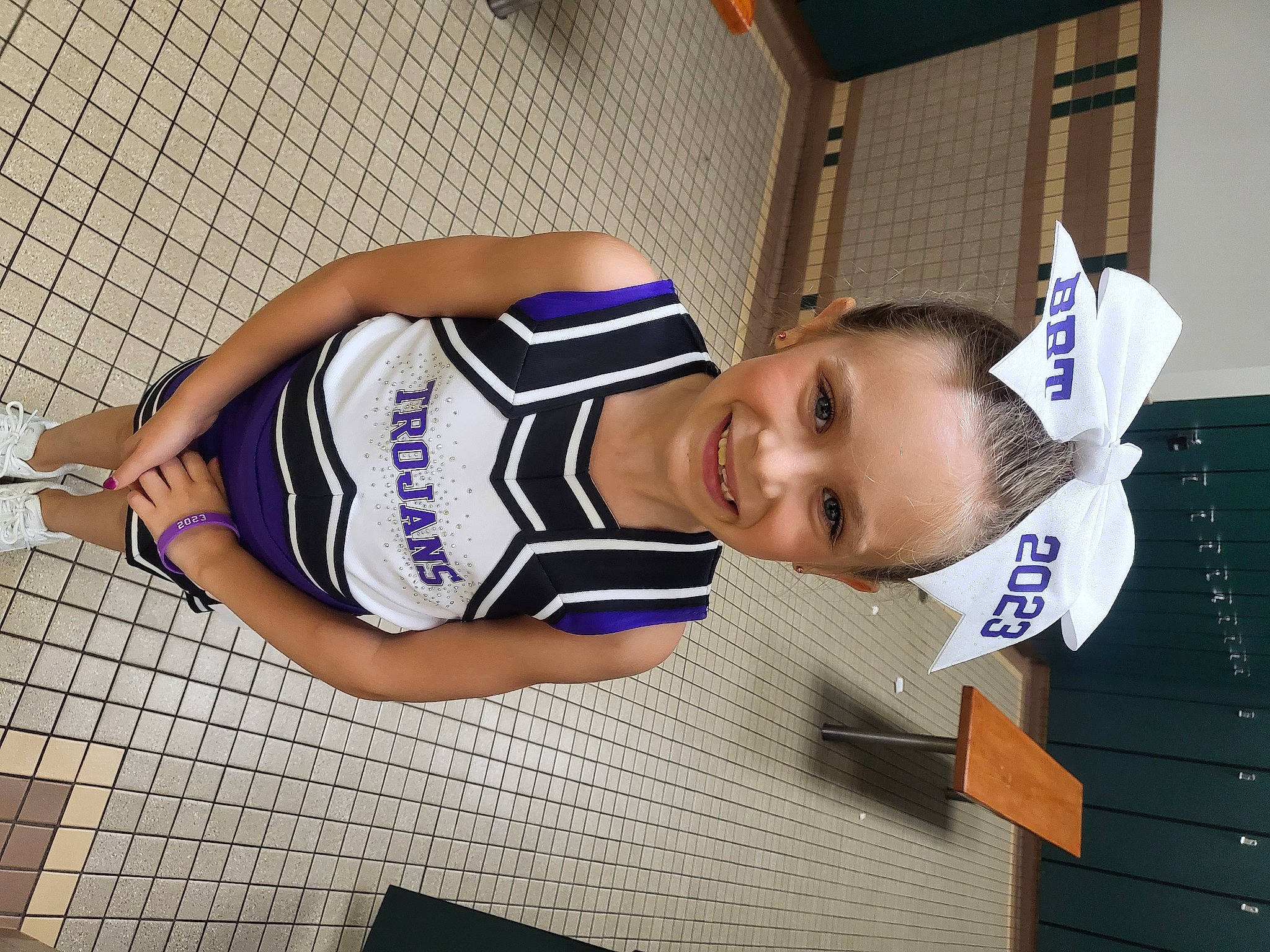 Sophia is registered to the contest to win money with this photo: chest, elbow, electric_blue, human_leg, joy, knee, person, shorts, sleeveless_shirt, smile, sports, sports_jersey, sports_uniform, sportswear, thigh, uniform, waist, wrist