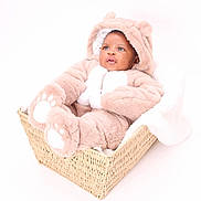Ahkari joined the competition — help win amazing prizes! baby, infant, child, basket, onesie, bear_costume, fluffy, cute, portrait, soft, blanket, white_background, cozy, pout, wide_eyes, seated, adorable, warm, indoor, newborn