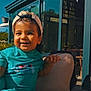 Jayden participe au concours pour gagner de l'argent avec cette photo : toddler, child, smiling, cap, outdoor, sunlight, building, glass, reflection, plant, sitting, casual_clothing, happy, portrait, daylight, concrete, shadow, playful, baby, cute