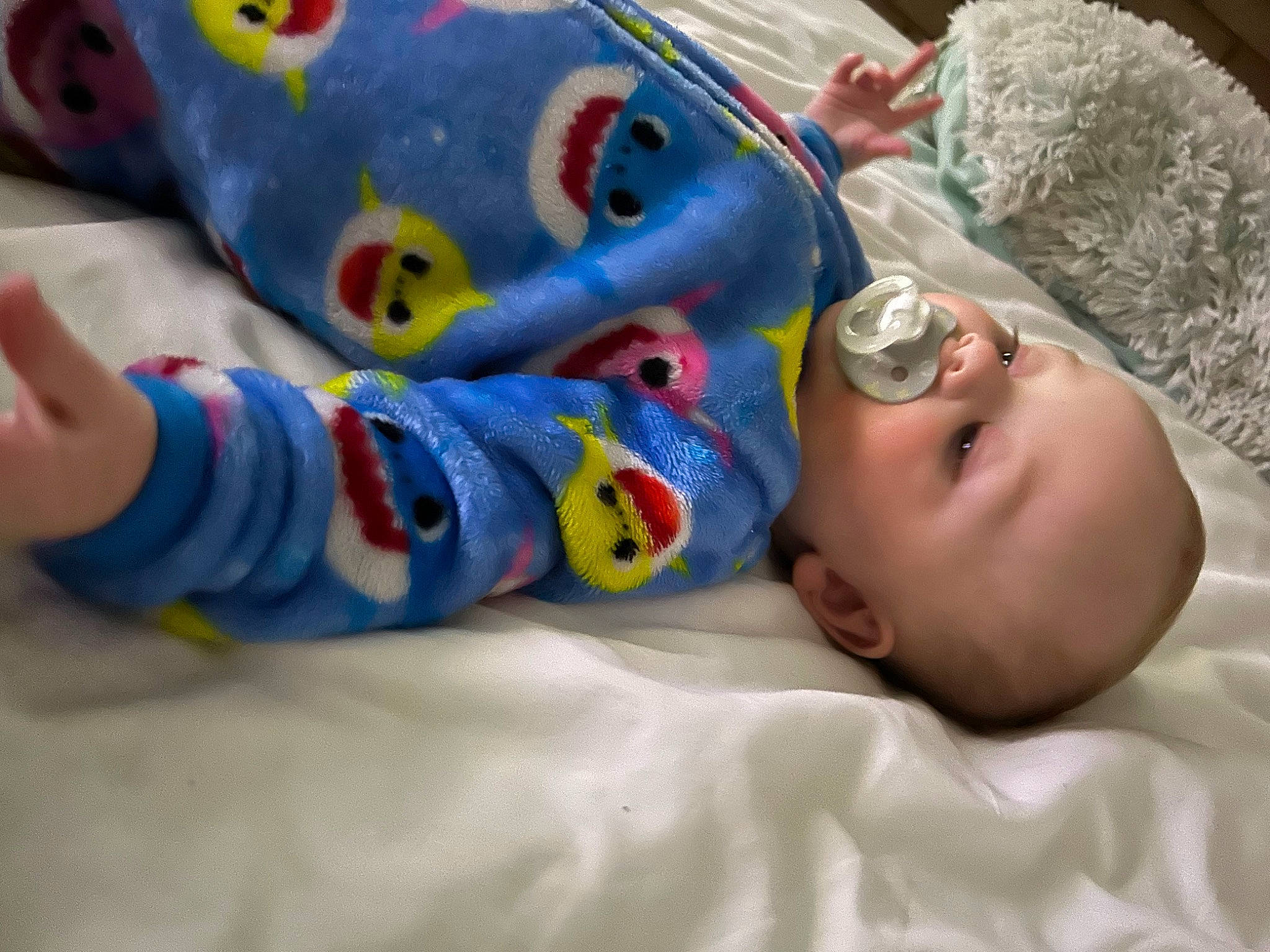 Joshua is registered to the contest to win money with this photo: art, baby, baby_products, baby_toddler_clothing, baby_toys, child, comfort, finger, gesture, head, linens, mouth, nail, person, room, skin, sleep, stuffed_toy, thumb, toddler