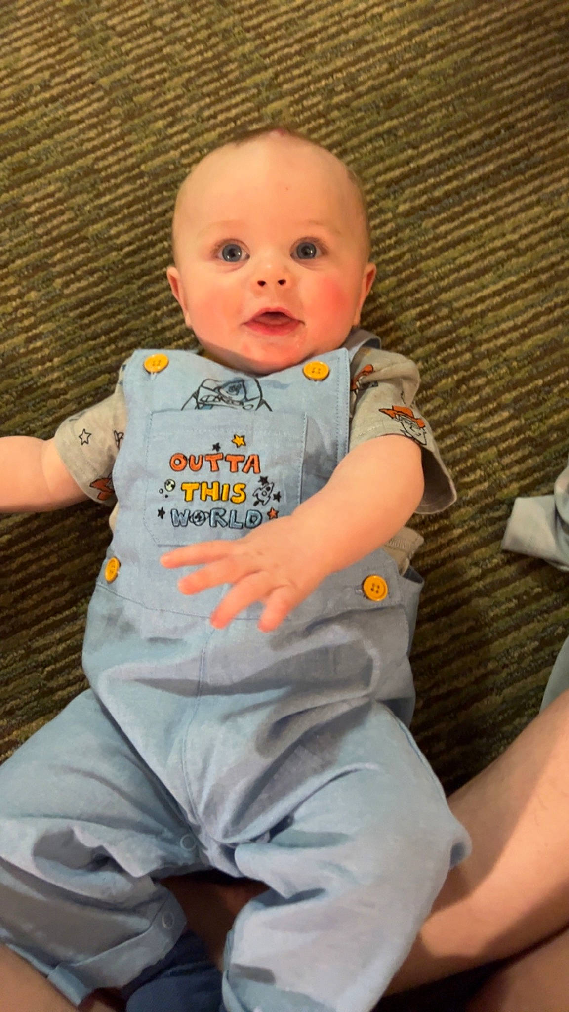 Joshua joined the competition — help win amazing prizes! baby, baby_products, baby_toddler_clothing, chair, cheek, child, comfort, eye, flooring, iris, linens, person, pink, product, sitting, skin, sleeve, sportswear, surprise, t_shirt