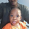 Genesis joined the competition — help win amazing prizes! child, toddler, woman, selfie, portrait, face, expression, pucker, hoop_earrings, orange_clothing, ruffles, indoor, casual_clothing, skin, person, cute, playful, closeup, family, love