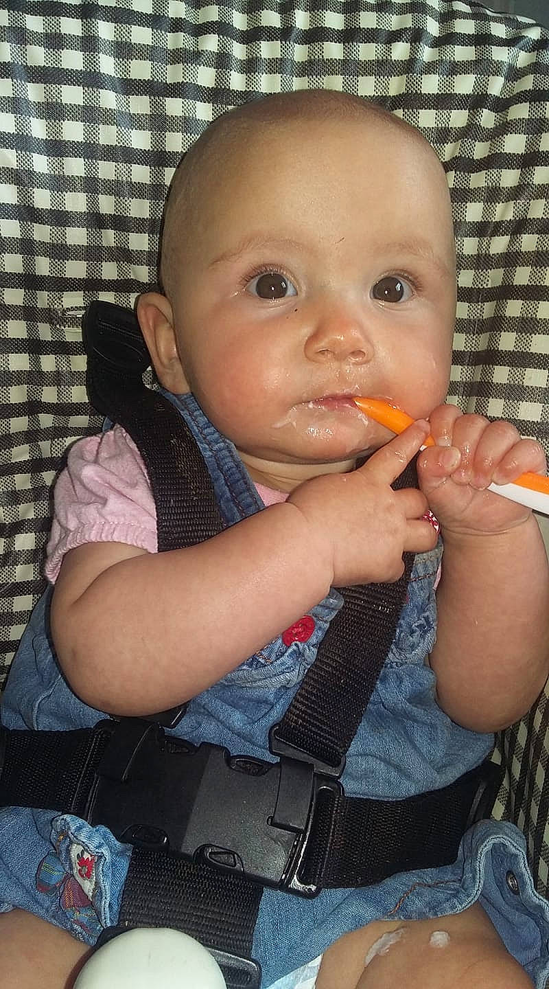 Kacey joined the competition — help win amazing prizes! abdomen, black_hair, cheek, child, chin, eye, finger, forehead, fun, girl, hand, head, infant, mouth, nose, person, sitting, skin, smile, toddler