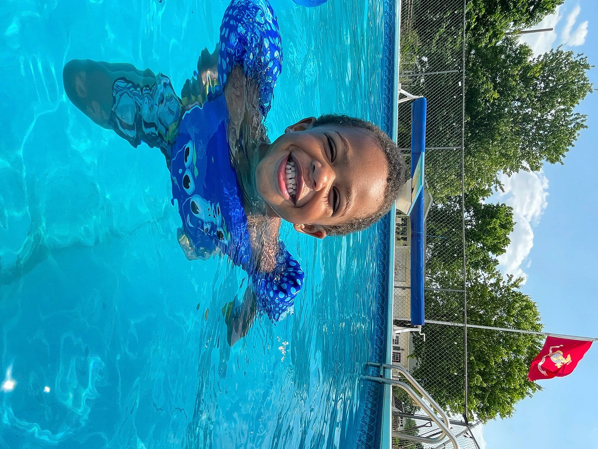 King joined the competition — help win amazing prizes! amusement_park, azure, bathing, blue, child, electric_blue, facial_expression, fluid, fun, happy, joy, leisure, nonbuilding_structure, outdoor_recreation, person, recreation, sky, smile, swimming_pool, toddler
