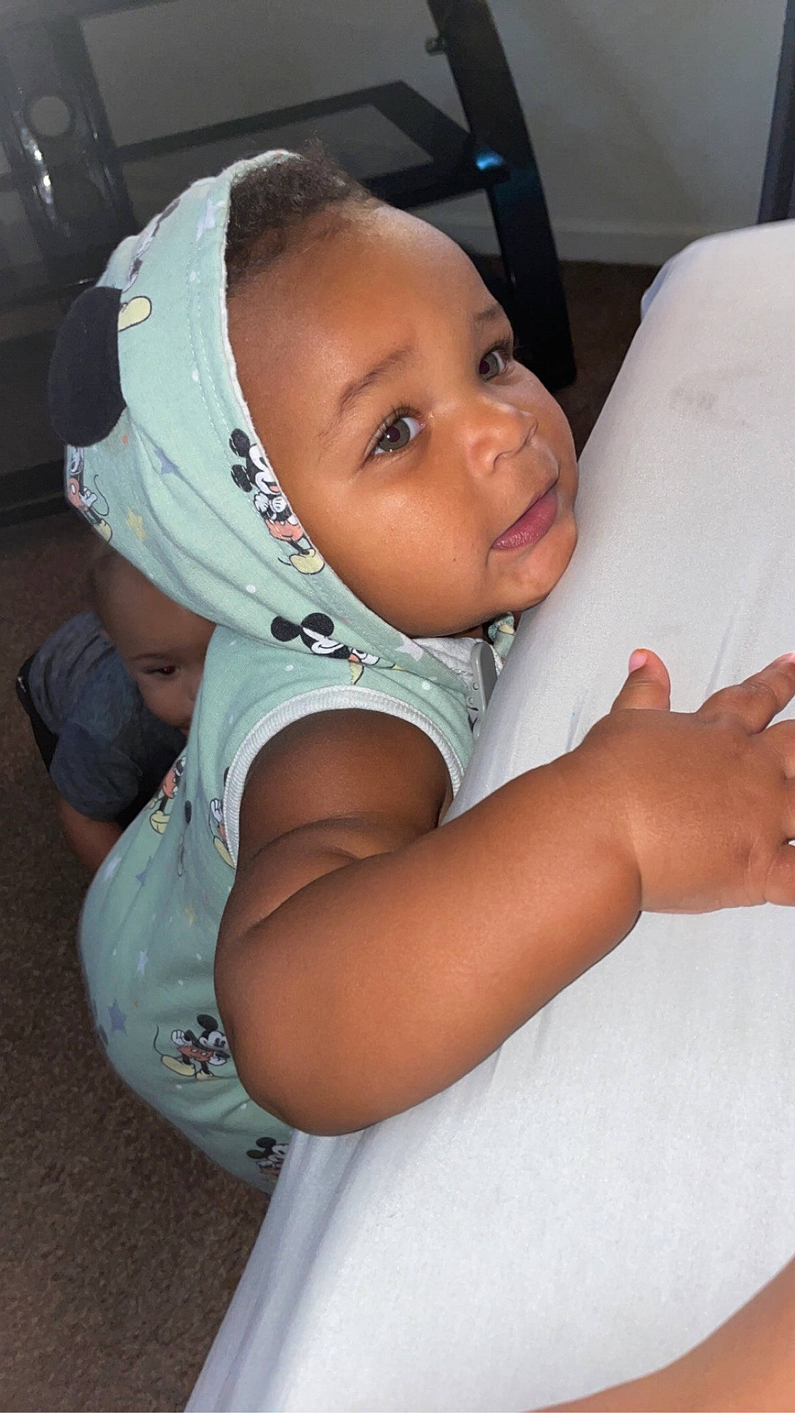 Kylen is registered to the contest to win money with this photo: baby, baby_products, baby_toddler_clothing, cheek, child, comfort, elbow, eye, eyebrow, fashion_accessory, fun, gesture, happy, mouth, person, sitting, skin, smile, t_shirt, thumb