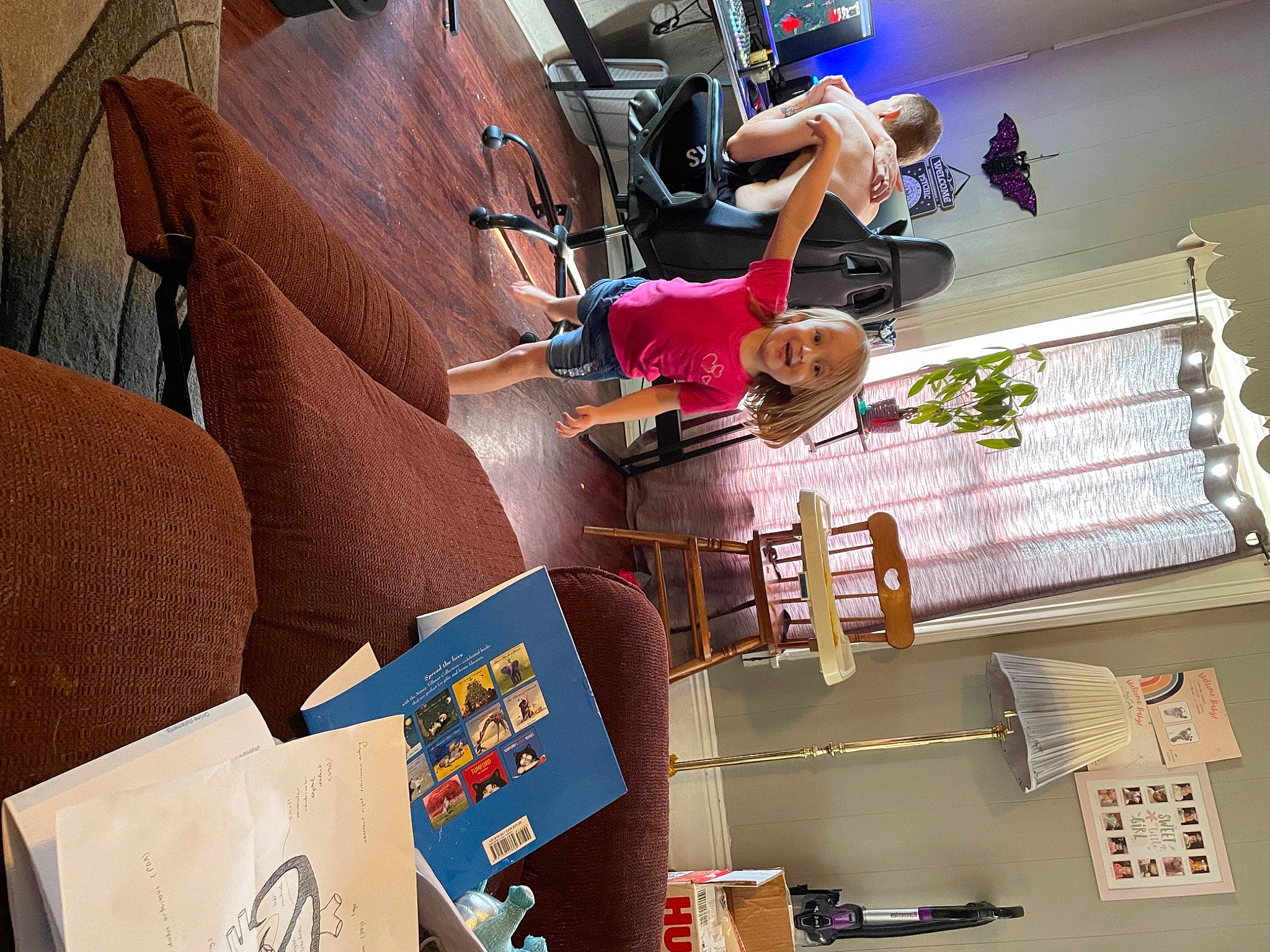 Jessie is registered to the contest to win money with this photo: art, artist, chair, collection, event, joy, leisure, paper_product, person, room, shelving, shipping_box, urban_design, visual_arts, wood