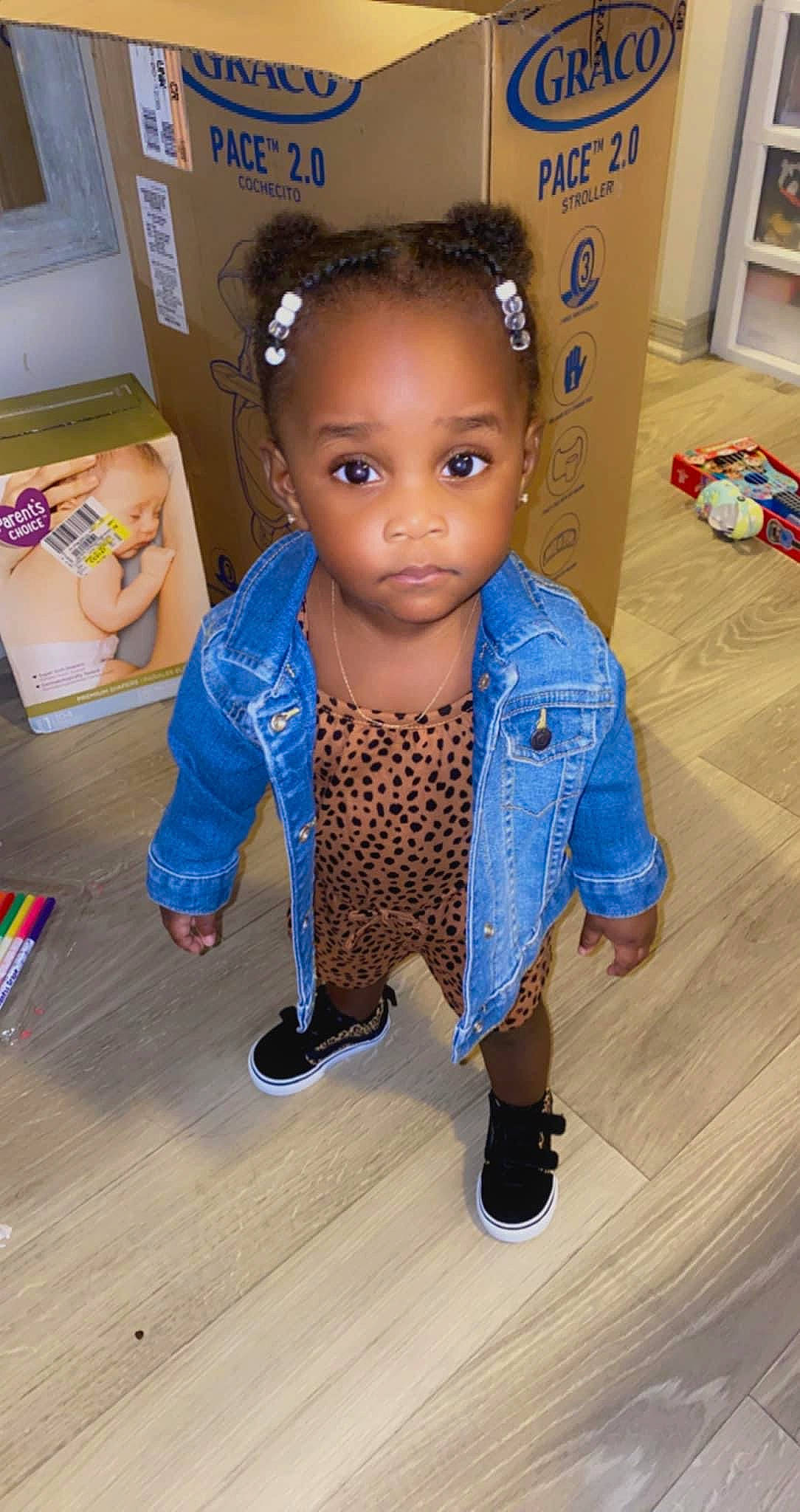 Jaliyah joined the competition — help win amazing prizes! baby, baby_toddler_clothing, chair, cheek, doll, electric_blue, eye, eyelash, fawn, floor, flooring, hair, happy, hardwood, head, iris, person, skin, sleeve, t_shirt