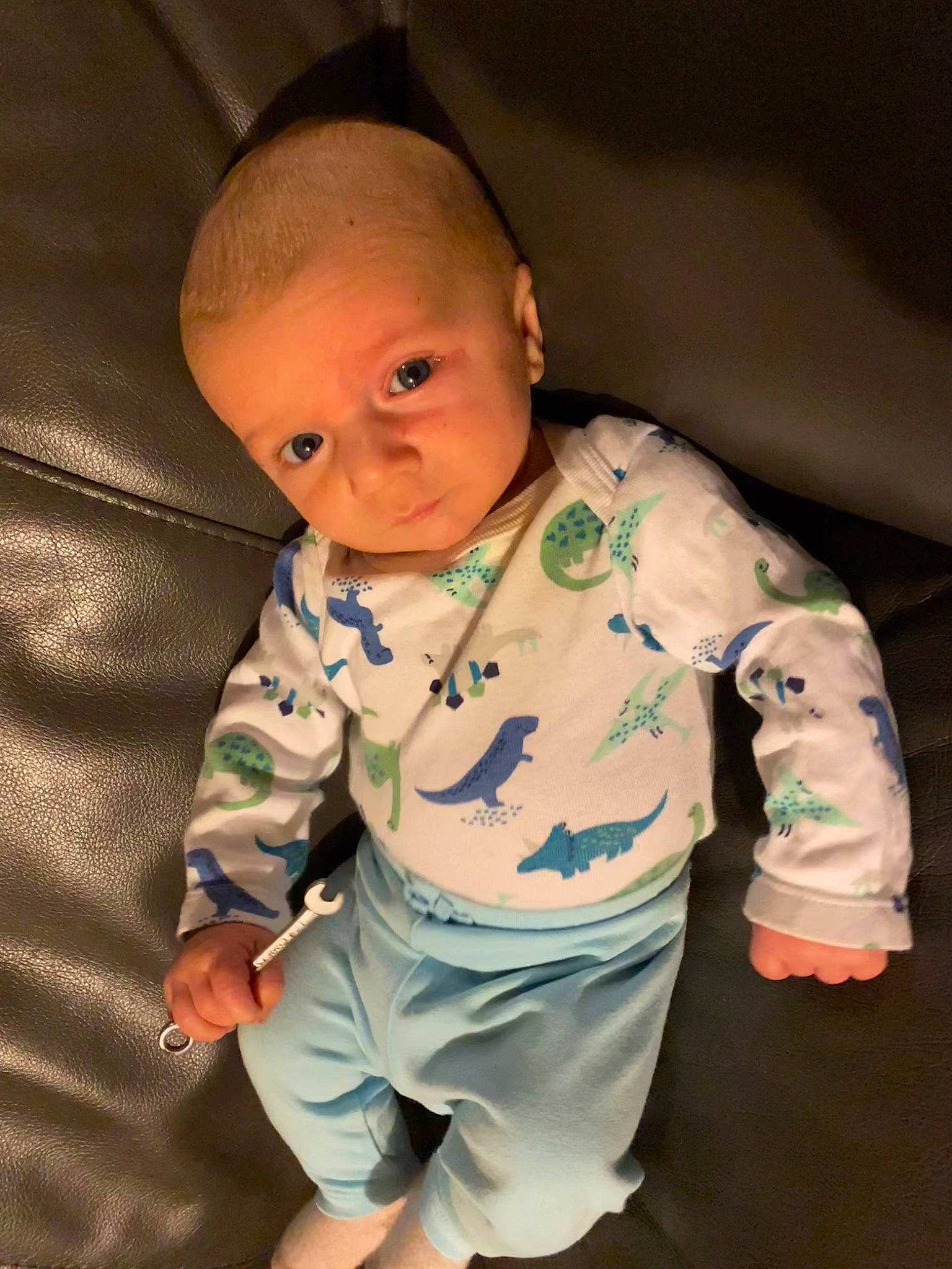 Scott Kopas is registered to the contest to win money with this photo: baby, baby_products, baby_safety, baby_toddler_clothing, cheek, child, comfort, elbow, human_body, linens, nose, pattern, person, room, sitting, skin, sleeve, toddler