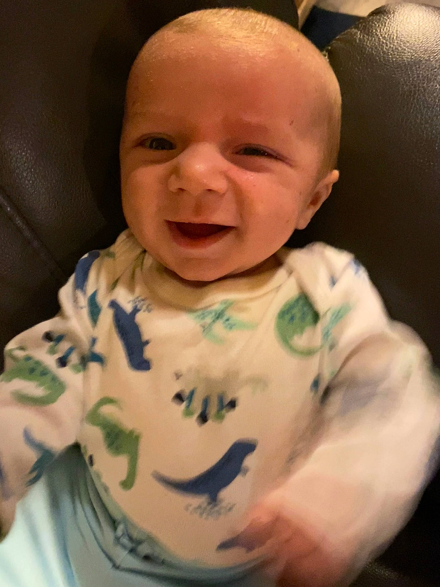 Scott Kopas is registered to the contest to win money with this photo: baby, baby_toddler_clothing, cheek, chin, comfort, eyebrow, happy, human_body, iris, jaw, lip, mouth, neck, nose, person, skin, sleeve, smile, t_shirt, toddler