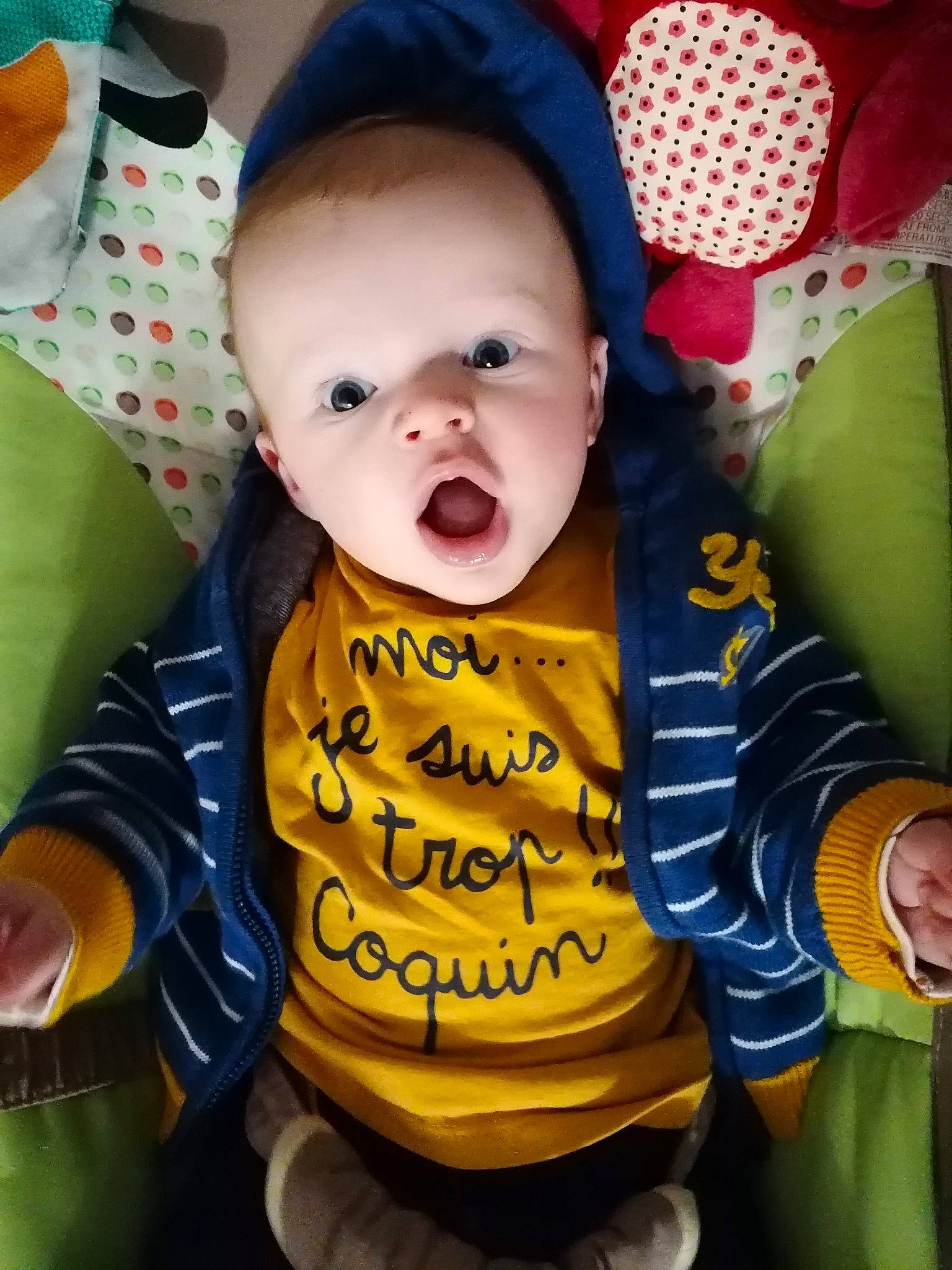 Tom a rejoint le concours — aidez-le/la à gagner de superbes lots ! baby, baby_toddler_clothing, cheek, cool, face, facial_expression, fun, hairstyle, happy, head, human_body, mouth, nose, orange, outerwear, person, pink, product, skin, sleeve