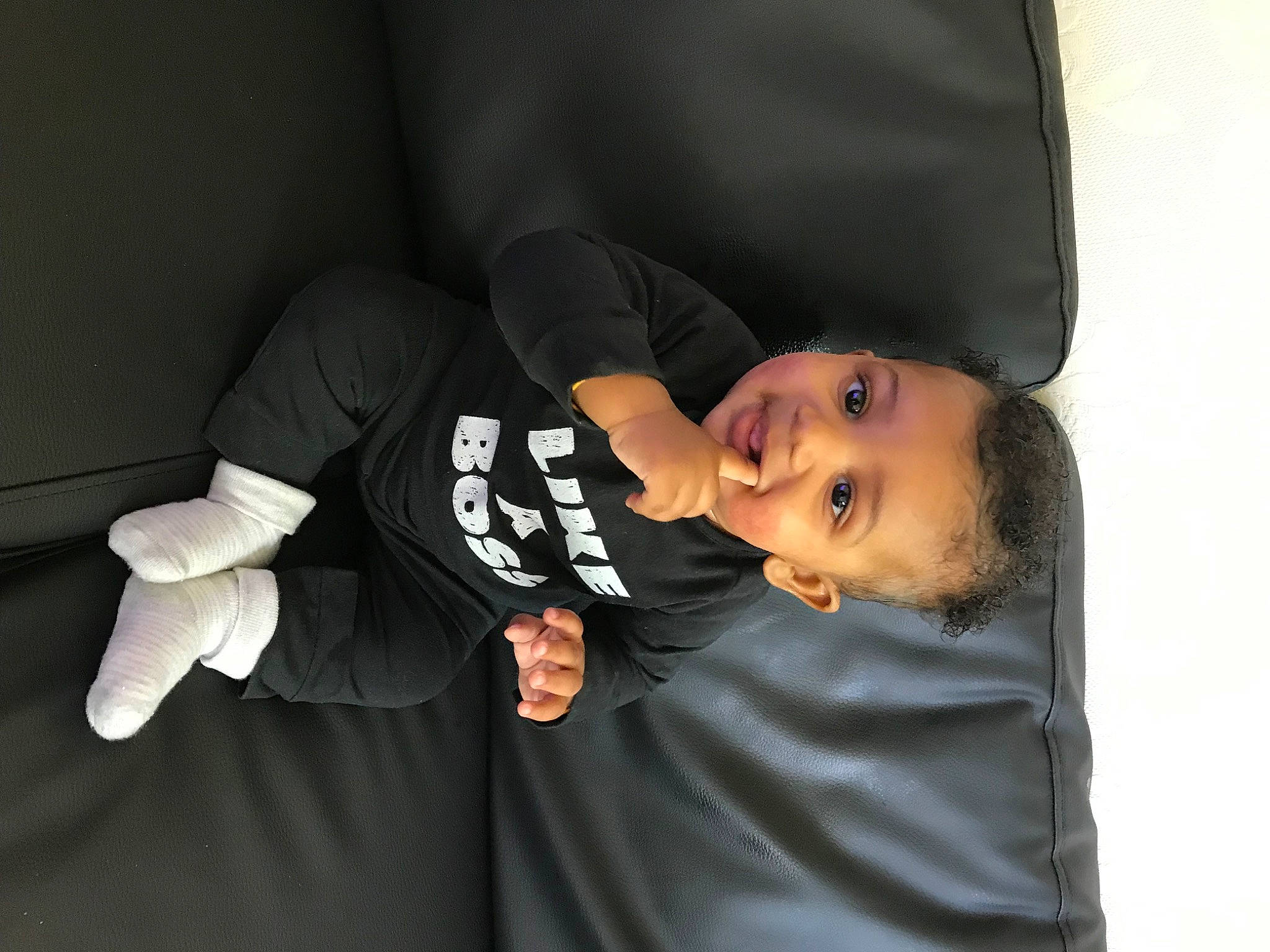 Miles is registered to the contest to win money with this photo: baby, baby_products, baby_toddler_clothing, cheek, child, comfort, darkness, elbow, finger, flash_photography, fun, joy, linens, person, room, sitting, sleep, sleeve, toddler