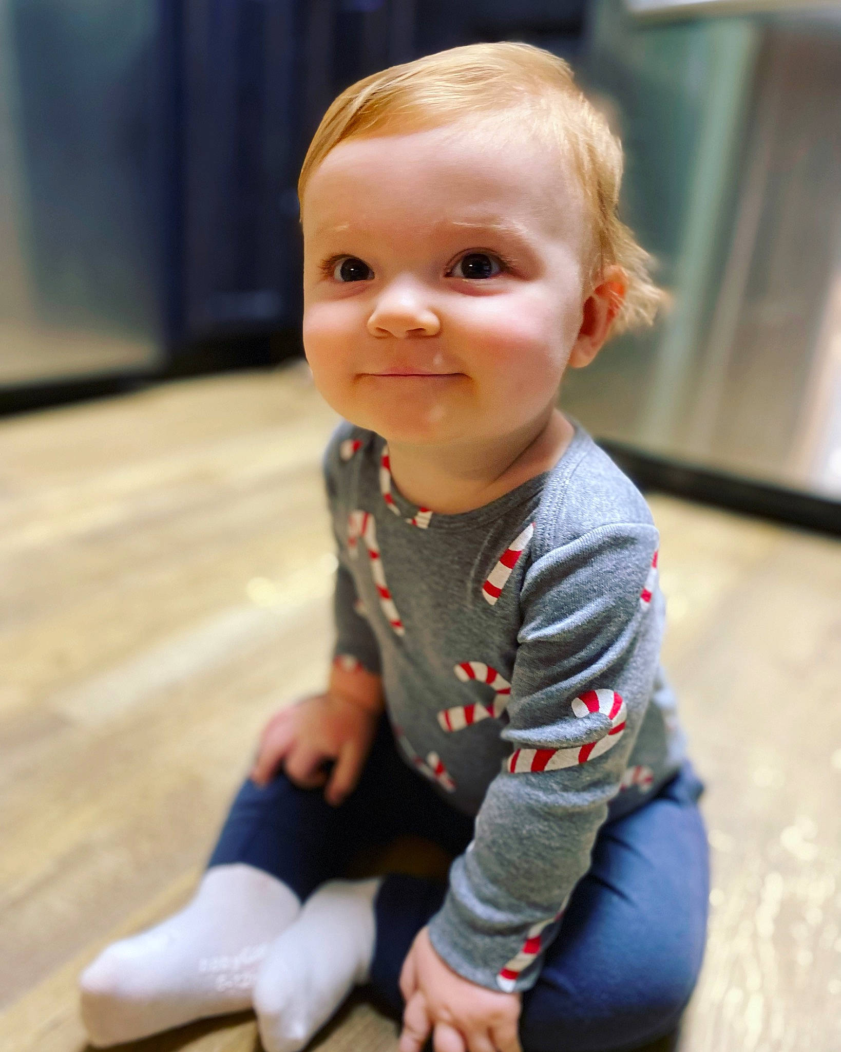 Greyson is registered to the contest to win money with this photo: baby, baby_toddler_clothing, cheek, chin, clothing, dress, face, floor, flooring, hair, happy, head, human_body, iris, joy, nose, person, skin, sleeve, smile