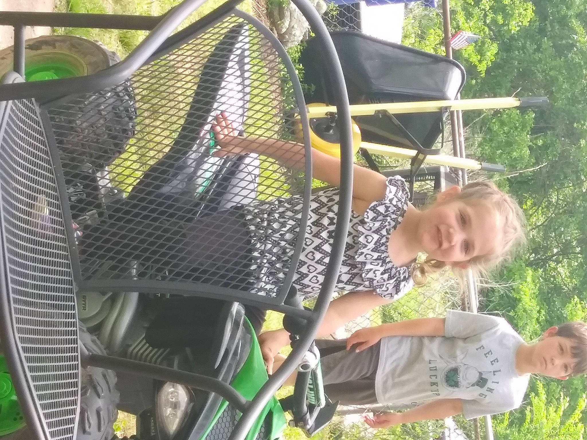 Ashtyn Sage is registered to the contest to win money with this photo: backpack, bag, fun, grass, joy, jungle, leisure, luggage_and_bags, motor_vehicle, person, plant, recreation, shorts, t_shirt, tourism, transport, travel, tree, vacation, yellow