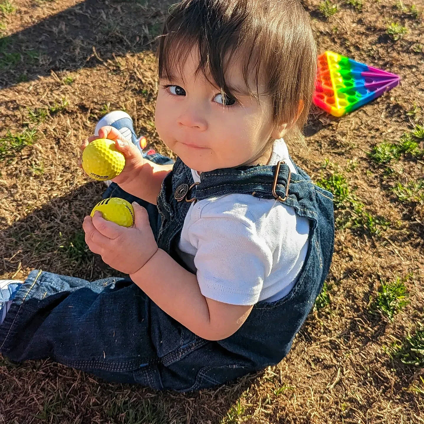 Marco joined the competition — help win amazing prizes! child, fun, grass, grassland, happy, landscape, leisure, liquid_bubble, people_in_nature, person, play, shadow, sitting, soil, t_shirt, tints_and_shades, toddler, toy