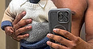 Kasai is registered to the contest to win money with this photo: baby, child, man, mirror, selfie, smartphone, sweater, tie, pants, shoes, bathroom, sink, countertop, hand, portrait, indoor, reflection, fashion, cute, person