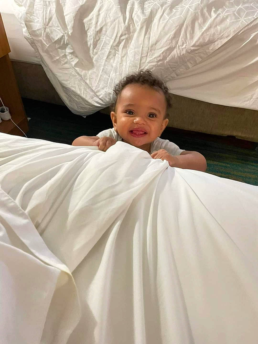 Matteo joined the competition — help win amazing prizes! bed, bed_sheet, bedding, bedroom, bridal_accessory, bridal_clothing, child, comfort, dress, event, formal_wear, fun, gown, happy, human_body, joy, linens, person, sleeve, smile