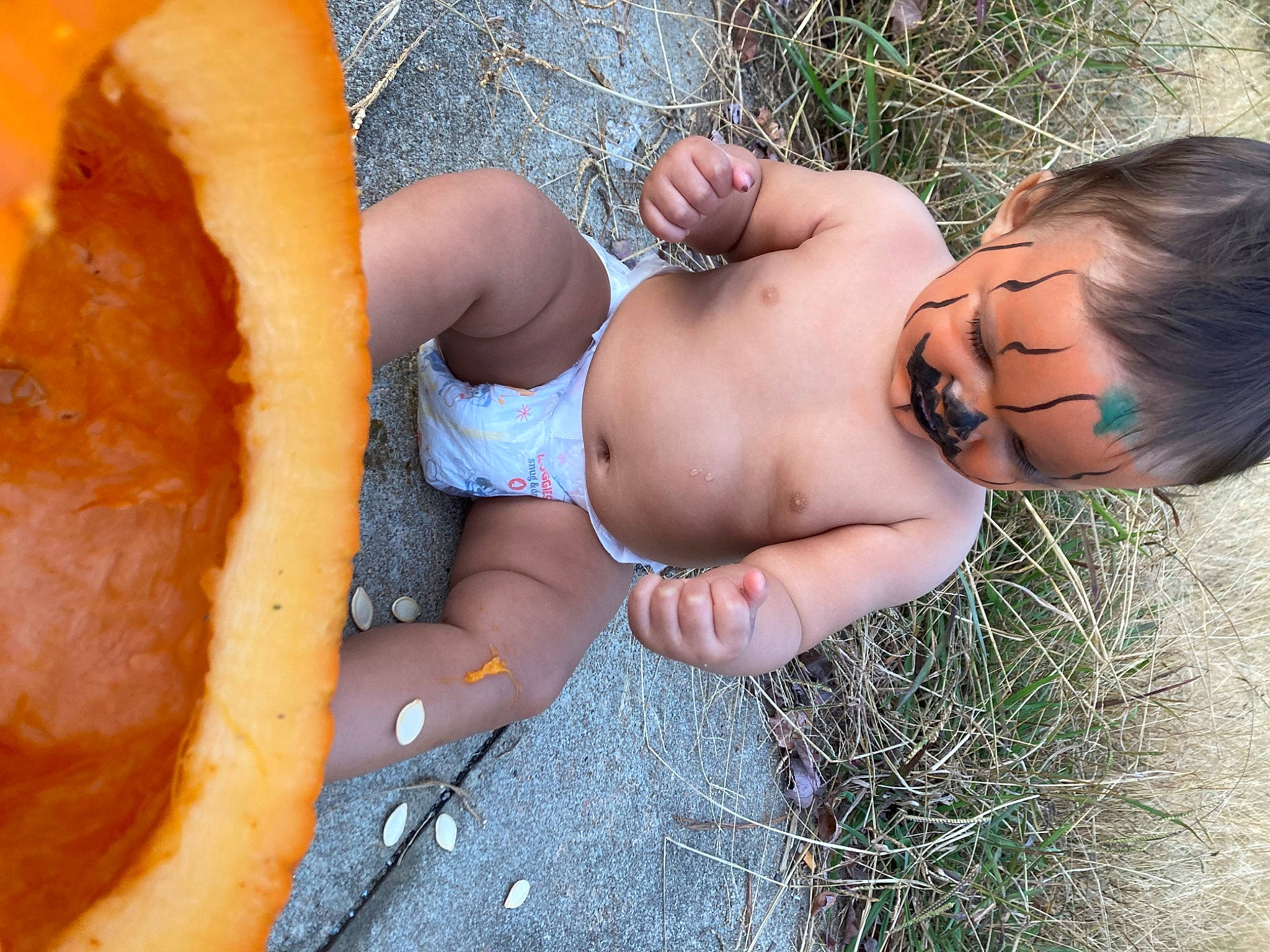Wyndu is registered to the contest to win money with this photo: abdomen, baby, barechested, chest, fawn, grass, hand, happy, head, human_body, human_leg, landscape, leisure, navel, people_in_nature, person, plant, thigh, toddler, tree