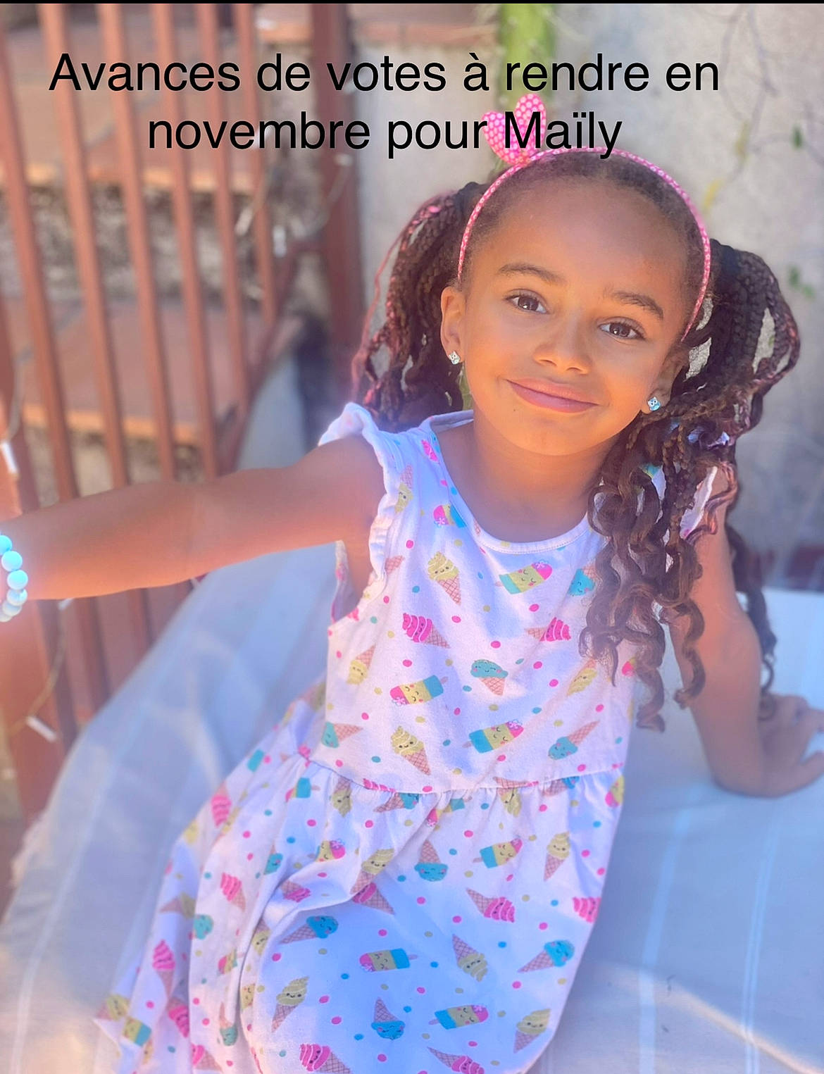 Maïly participe au concours pour gagner de l'argent avec cette photo : beauty, black_hair, child, electric_blue, facial_expression, fashion_design, fun, happy, joy, leisure, magenta, neck, pattern, person, purple, recreation, skin, sleeve, smile, summer