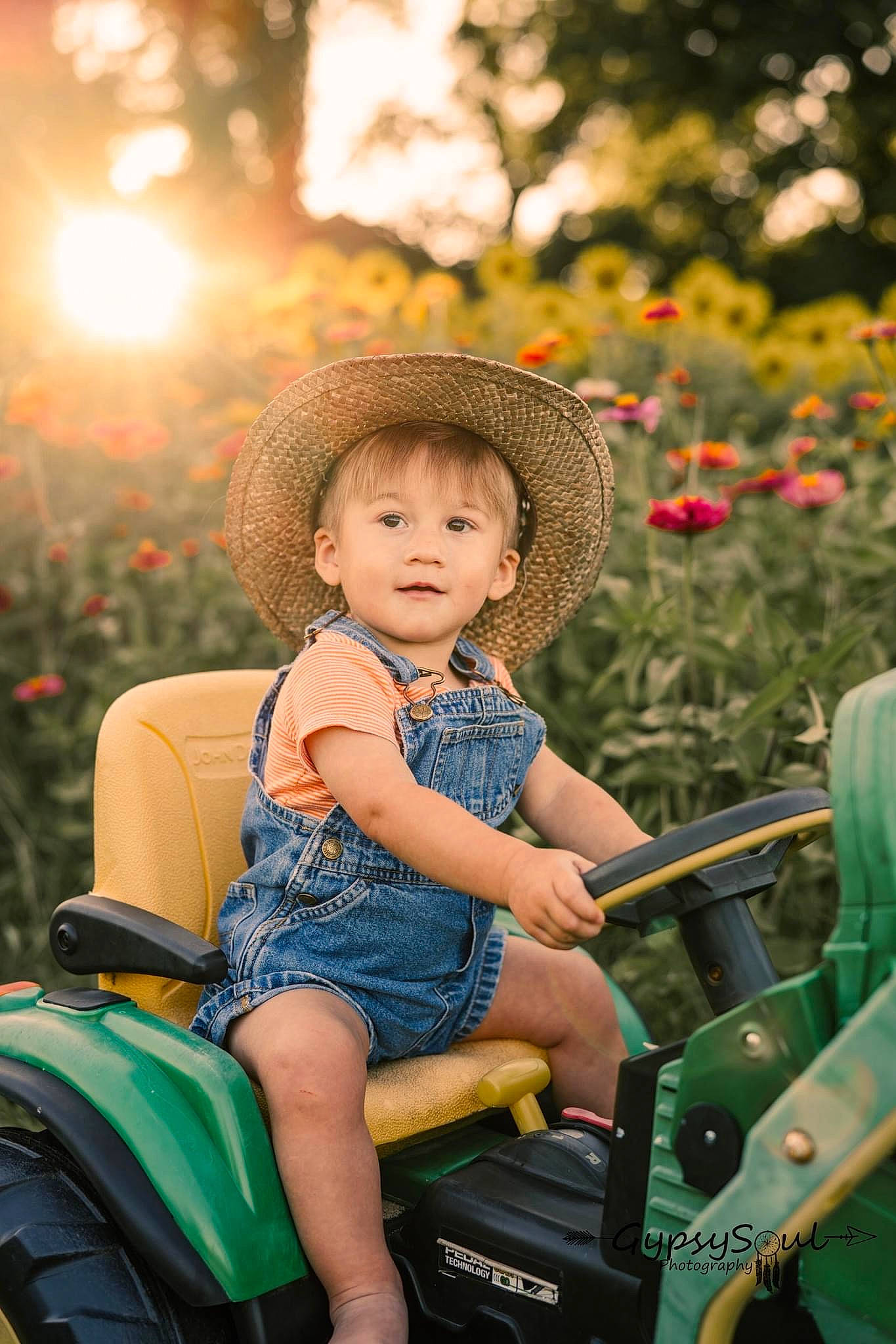 Tanner is registered to the contest to win money with this photo: eye, flash_photography, flower, fun, grass, green, happy, hat, leaf, leisure, light, motor_vehicle, people, people_in_nature, person, plant, recreation, summer, sun_hat, sunlight