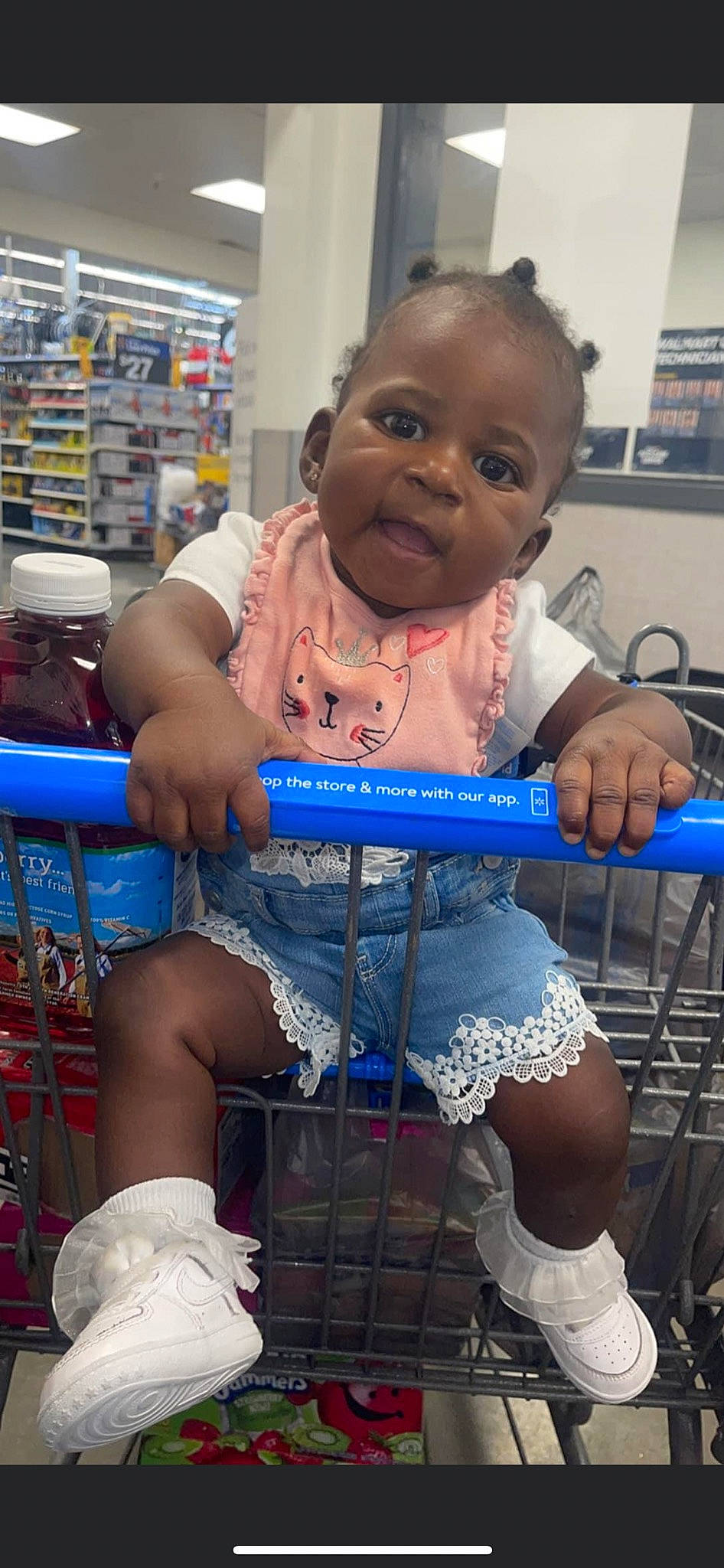 Zakiyah is registered to the contest to win money with this photo: baby, baby_products, blue, child, customer, electric_blue, fun, happy, human_leg, knee, lap, person, personal_protective_equipment, shelf, shopping_cart, sitting, skin, smile, thigh, toddler