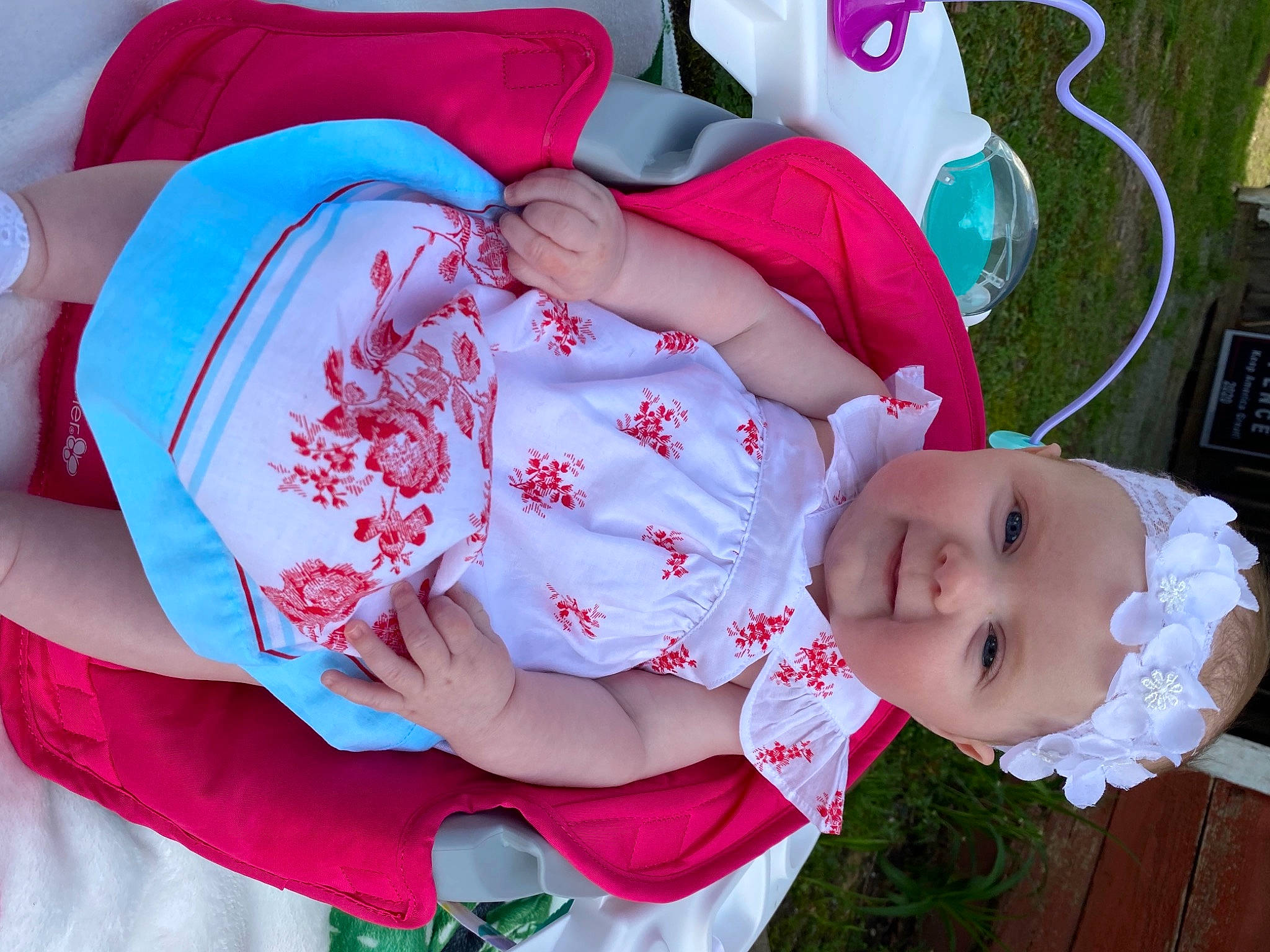 Charlotte joined the competition — help win amazing prizes! baby, baby_products, baby_toddler_clothing, carmine, child, event, facial_expression, grass, happy, hat, headgear, headwear, magenta, pattern, person, pink, red, skin, sleeve, textile