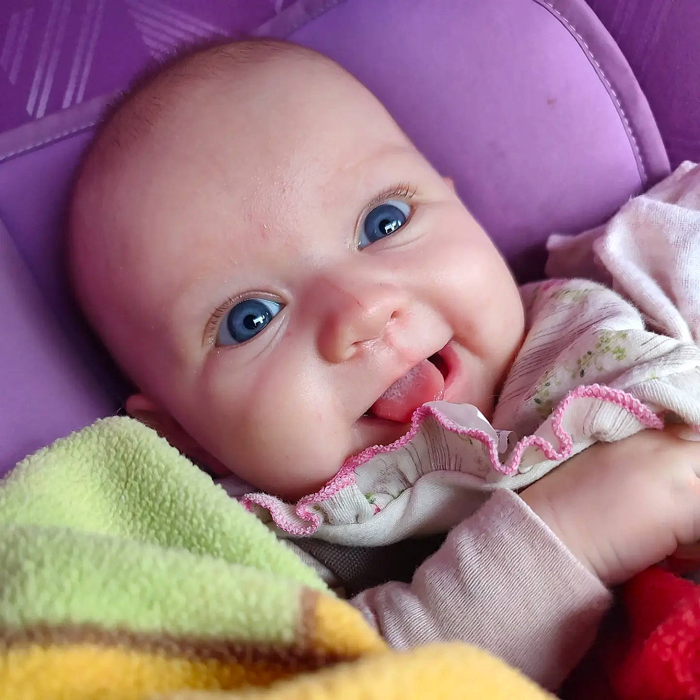 Diana is registered to the contest to win money with this photo: baby, cheek, chin, comfort, eye, eyebrow, eyelash, face, facial_expression, human, iris, lip, mammal, mouth, nose, organ, outerwear, person, skin, smile