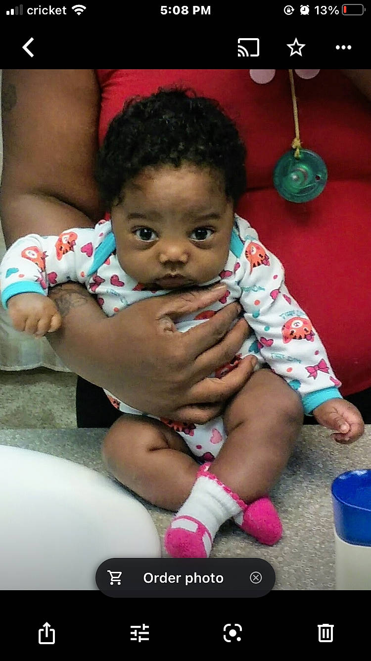 Lyric is registered to the contest to win money with this photo: abdomen, arm, baby, child, event, finger, flash_photography, fun, gesture, happy, jewellery, leisure, nail, person, play, product, room, sitting, skin, snapshot