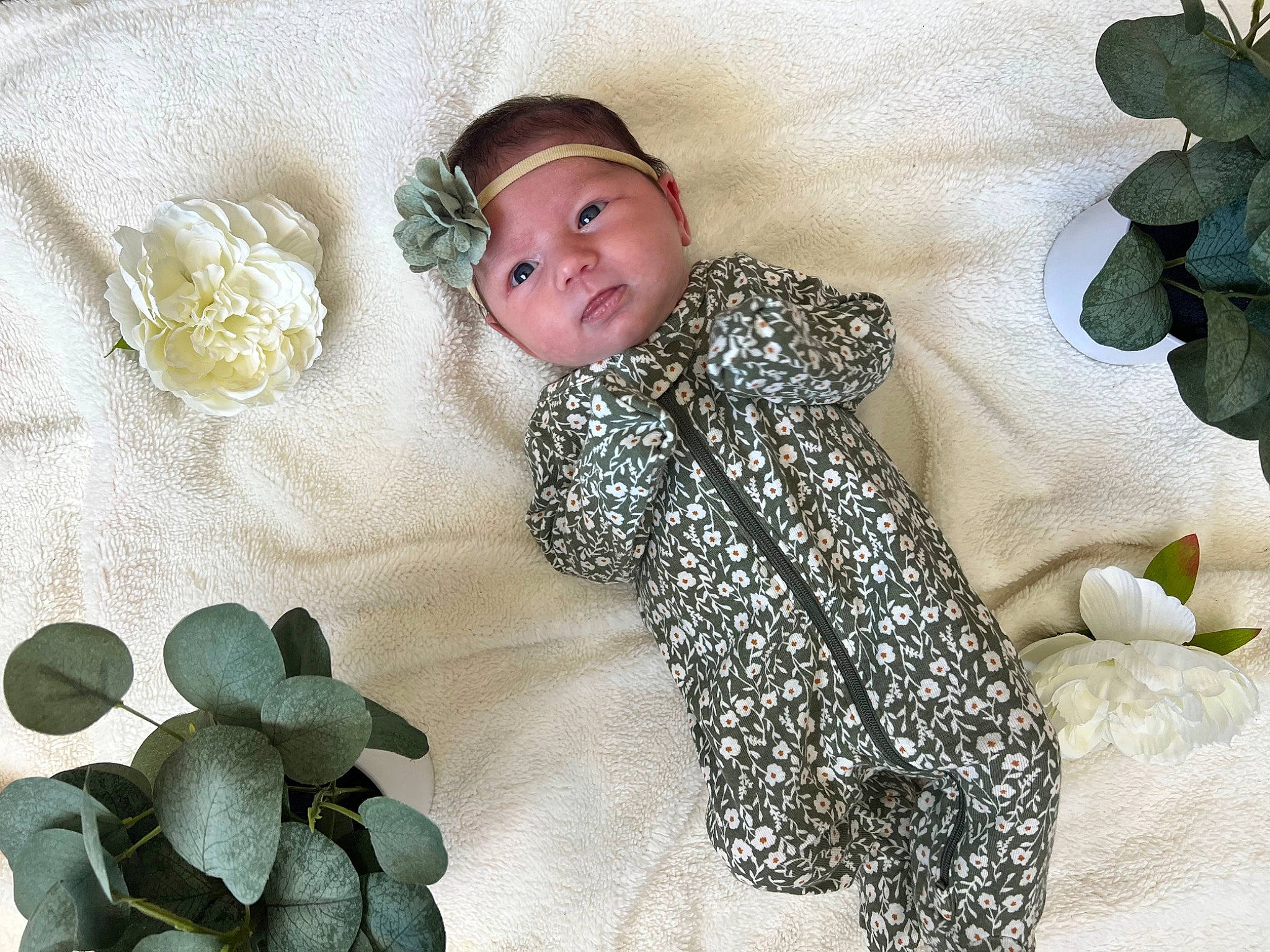 Syrenna is registered to the contest to win money with this photo: baby, baby_sleeping, baby_toddler_clothing, beauty, bedding, child, comfort, fashion_accessory, fur, headwear, leaf, linens, pattern, person, petal, plant, product, room, sun_hat, textile