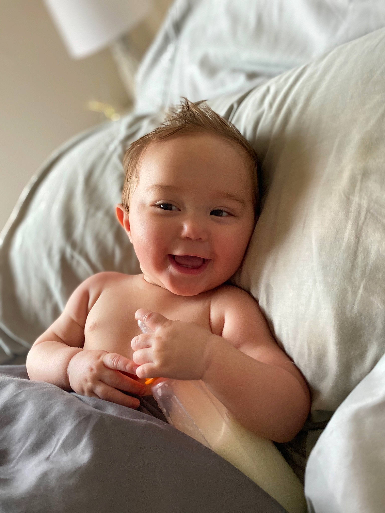 Braxten is registered to the contest to win money with this photo: arm, baby, cheek, child, comfort, face, finger, hand, person, skin, smile, thumb, toddler