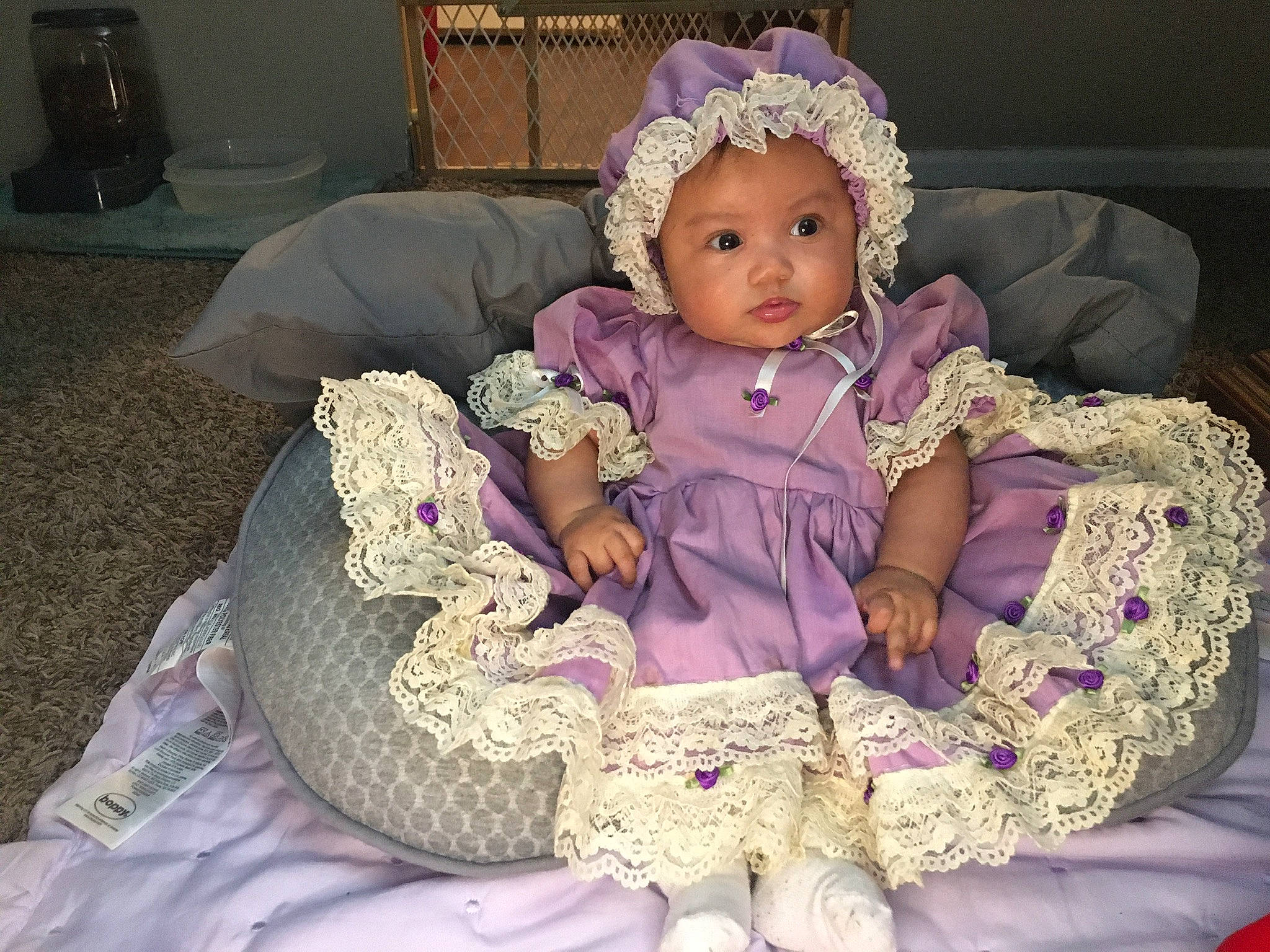 Laylah is registered to the contest to win money with this photo: baby, baby_products, baby_toddler_clothing, child, comfort, fashion_accessory, fur, headband, headgear, headpiece, headwear, iris, linens, magenta, pattern, person, pink, purple, sitting, toddler