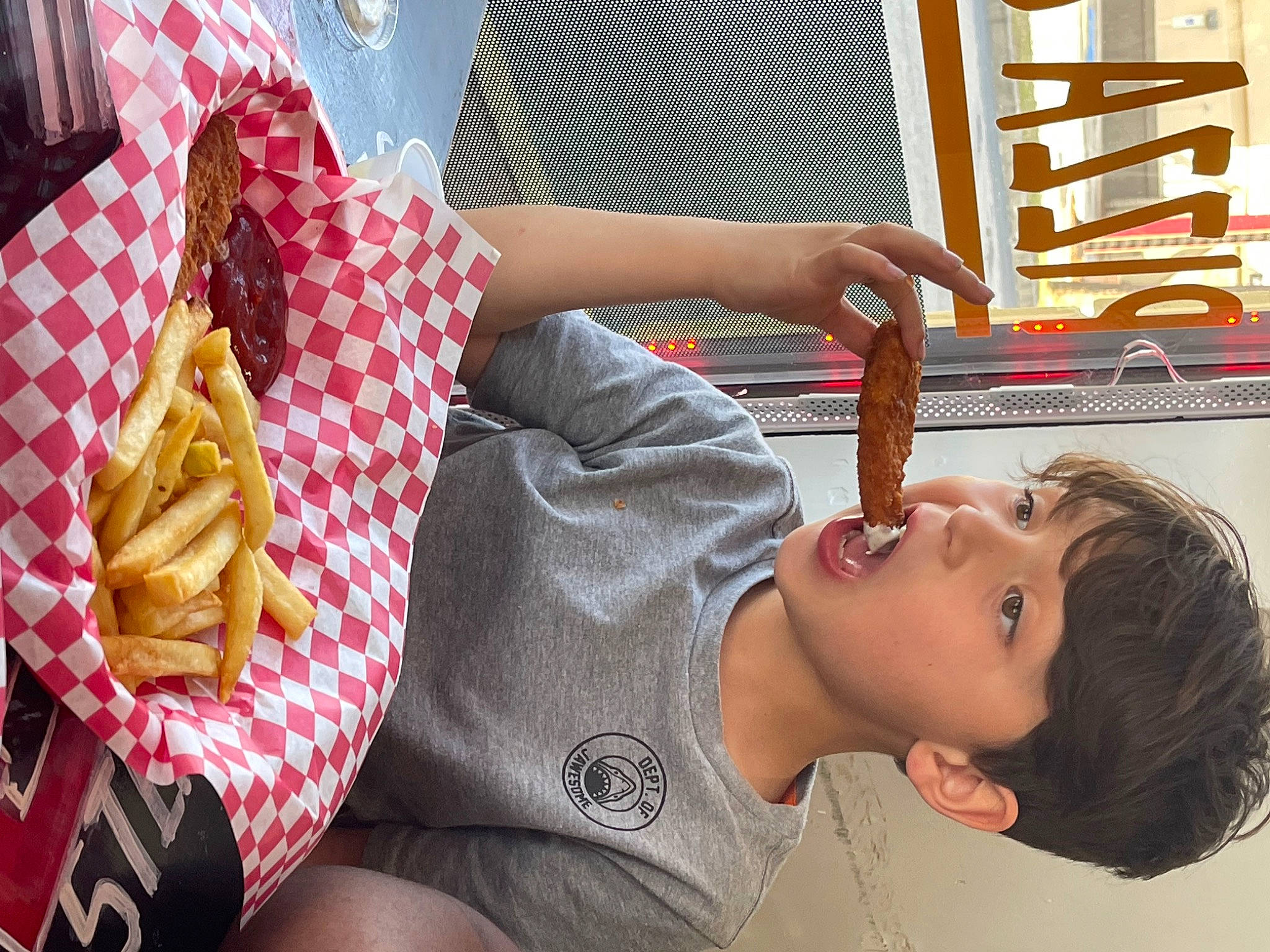 Ethan is registered to the contest to win money with this photo: beauty, chest, eyelash, eyewear, fast_food, finger, flag_of_the_united_states, food, french_fries, fun, hand, human, human_body, human_leg, leisure, nail, pattern, person, sitting, summer