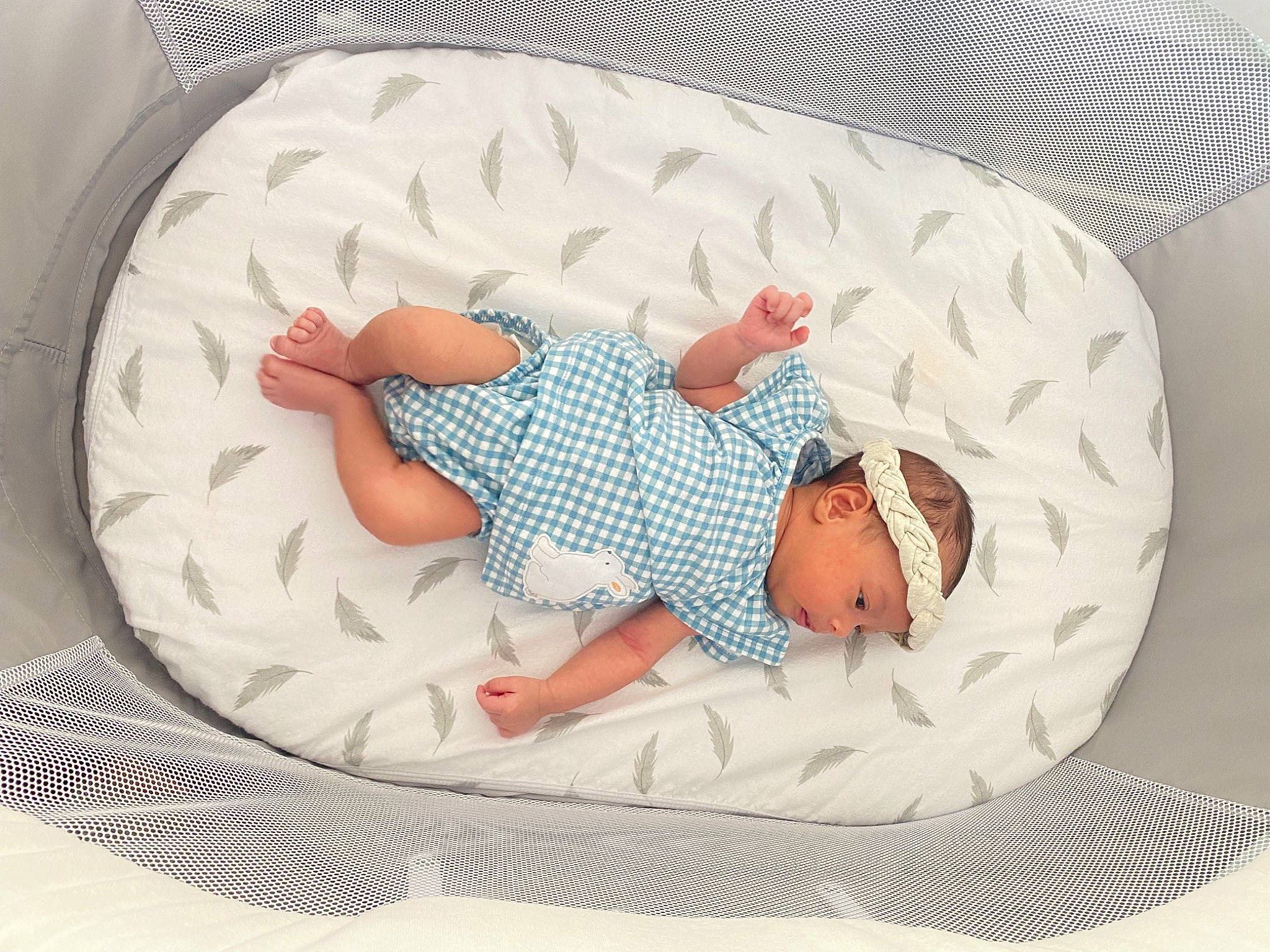 Ava is registered to the contest to win money with this photo: baby, baby_products, baby_safety, baby_sleeping, baby_toddler_clothing, bed, bedding, bedtime, child, comfort, headwear, human_body, infant_bed, linens, nap, pattern, person, product, room, sleeve