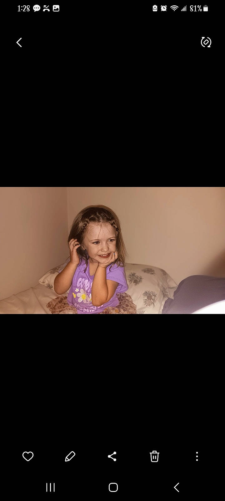 Lydia joined the competition — help win amazing prizes! baby, comfort, darkness, finger, flash_photography, flesh, flooring, fun, gesture, happy, joy, magenta, mouth, person, photo_caption, portrait, portrait_photography, room, sitting, smile