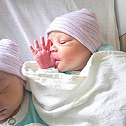 De'Naja Hines joined the competition — help win amazing prizes! newborn, baby, infant, twin_babies, swaddled, hospital_hat, striped_hat, blanket, sucking_thumb, hand, face, sleeping, portrait, close_up, skin, bed, nursery, cute, hospital, newborn_hat