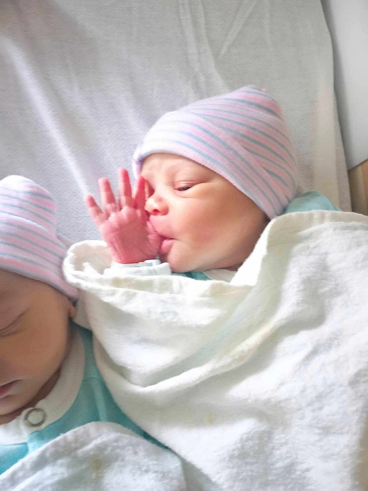 De'Naja Hines joined the competition — help win amazing prizes! newborn, baby, infant, twin_babies, swaddled, hospital_hat, striped_hat, blanket, sucking_thumb, hand, face, sleeping, portrait, close_up, skin, bed, nursery, cute, hospital, newborn_hat