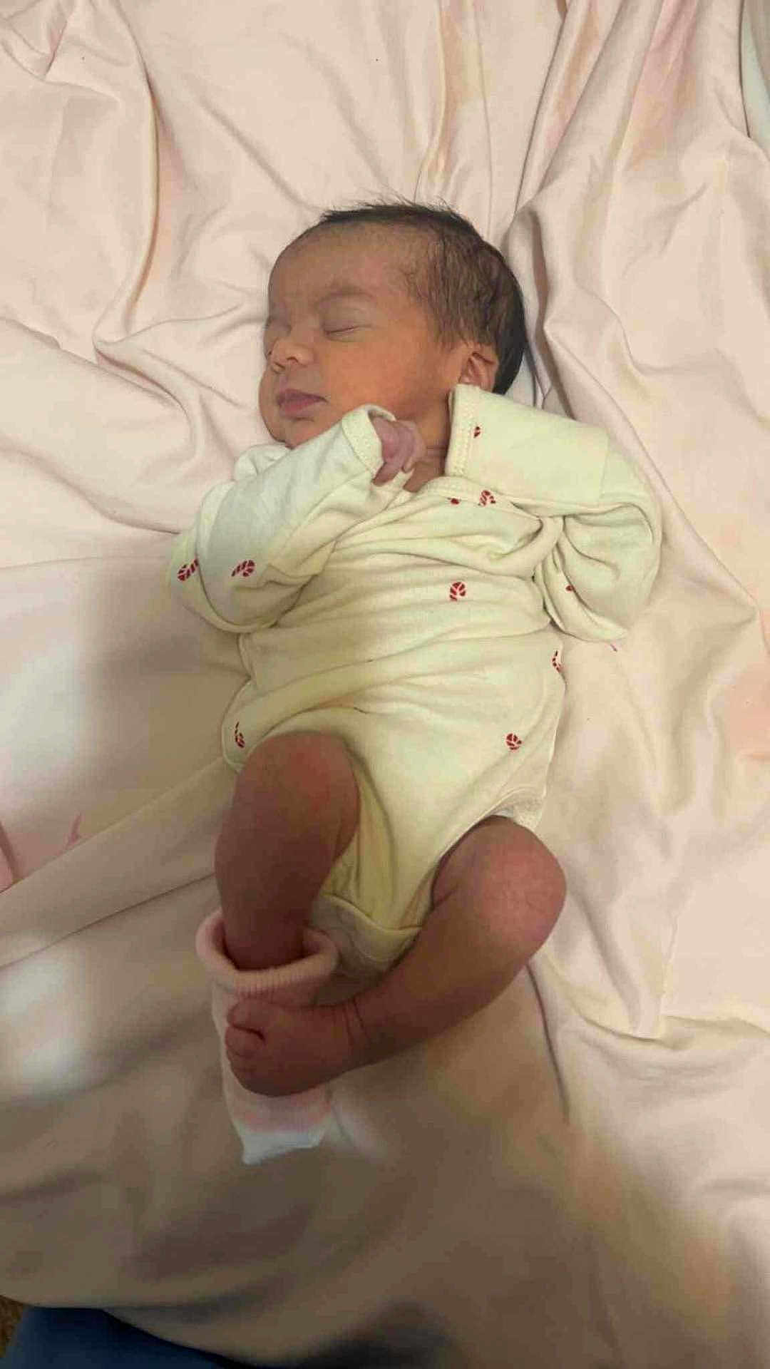 De'Nae joined the competition — help win amazing prizes! baby, newborn, infant, sleeping, onesie, blanket, bed_sheet, pink, sock, foot, toes, peaceful, portrait, face, head, hair, lying_down, nursery, cozy, soft_fabric