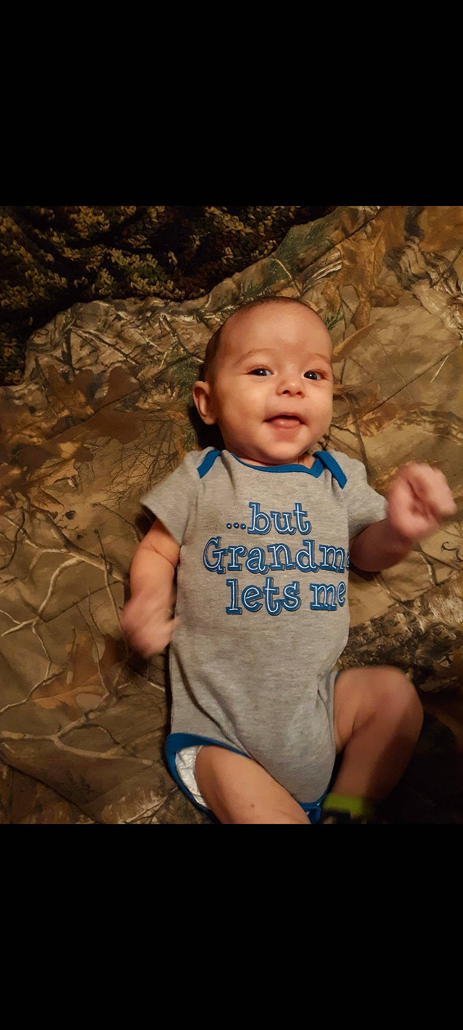 Christopher is registered to the contest to win money with this photo: baby, baby_toddler_clothing, cheek, chin, eye, face, flash_photography, fun, grass, happy, human_body, iris, leaf, leg, people_in_nature, person, skin, smile, t_shirt, toddler