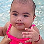 baby, child, swimming_pool, water, pink_swimsuit, hand, face, cute, earrings, bracelet, person, skin, wet, holding_hands, summer, outdoor, portrait, infant, young_child, expression